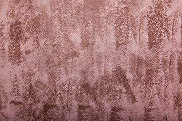 Textured plaster on the wall. Abstract brown background
