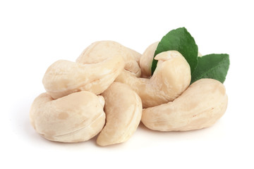 cashew nuts with leaf isolated on white background. macro