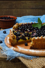 Homemade blueberries pie with custard on shortbread dough. Berries cake.
