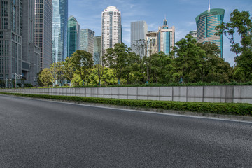 Fototapeta na wymiar urban traffic road with cityscape in background in Shanghai,China..