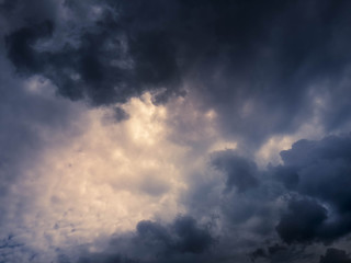 Fototapeta na wymiar Beautiful and powerful thunderstorm clouds in dusky sky