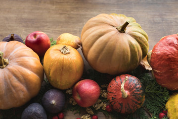 pumpkins and fruits on table