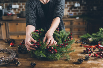 Christmas fir wreath with berries © LIGHTFIELD STUDIOS