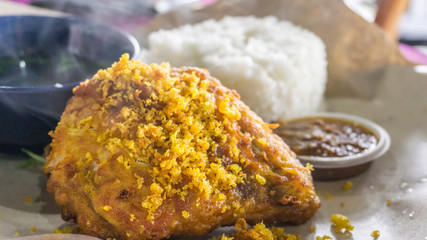 fried chicken served with rice