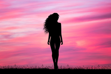 woman walking at sunset