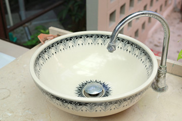 Retro round ceramic basin.