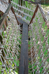 Rope bridge in childrens playground.