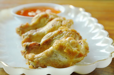 fried chicken drumsticks with salt and pepper dipping sweet chili sauce