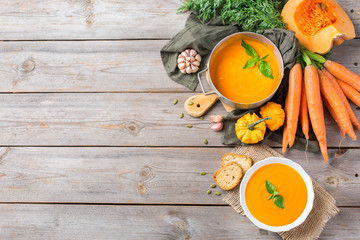 Fall autumn roasted orange pumpkin carrot soup with garlic