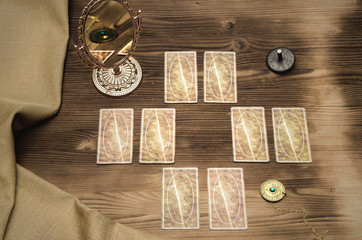 Tarot cards on wooden table. Divination. Fortune teller.