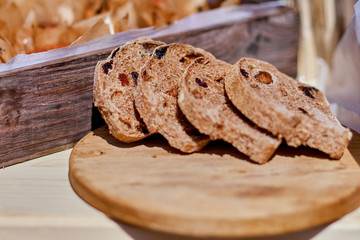 Sliced rye bread on cutting board closeup