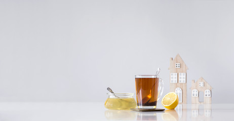 Glass of tea with honey and lemon