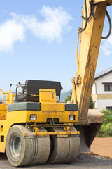 ロードローラーとショベルカー　スムーズローラー　締固め用機械　鉄輪ローラ