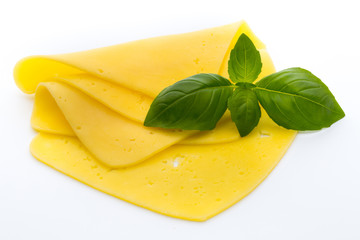Cheese slices on the white background.