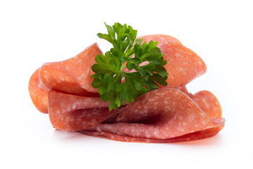 Salami slices isolated on white background.