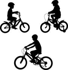 Fototapeta premium kids riding bicycles silhouettes - vector