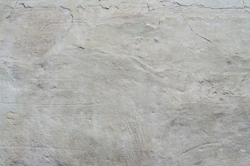 Gray wall with old plaster. Vintage background