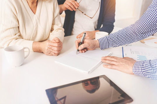 Pleasant Aged Couple Meeting With Real Estate Agent