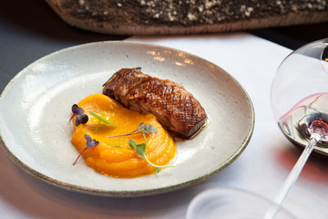 duck breast fillet with mashed potatoes spicy pumpkin - 174226883