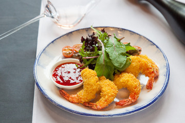 shrimp breaded with tomato sauce