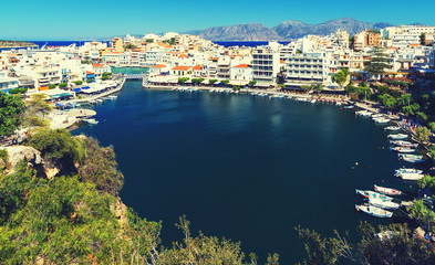 Agios Nikolaos, Crete, Greece. Agios Nikolaos is picturesque town in the eastern part of the island Crete built on the northwest side of the peaceful bay of Mirabello.