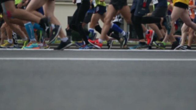 Group of people running in a marathon