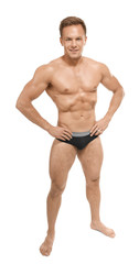 Muscular man in underwear on white background