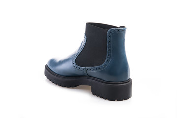 Blue suede boot isolated on white background.