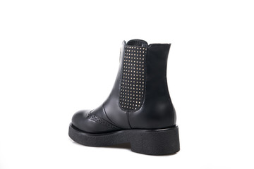 Black suede boot isolated on white background.