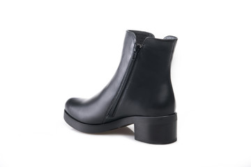 Black suede boot isolated on white background.