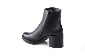 Black suede boot isolated on white background.