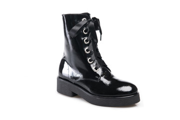 Black suede boot isolated on white background.