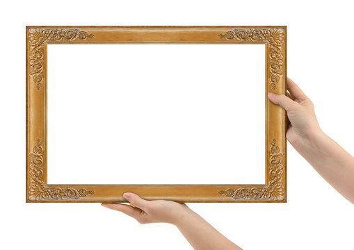 Wooden picture frame in hands