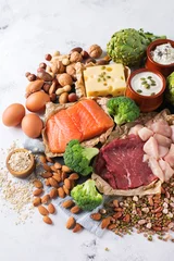 Foto auf Acrylglas Auswahl an gesunden Proteinquellen und Bodybuilding-Lebensmitteln © aamulya
