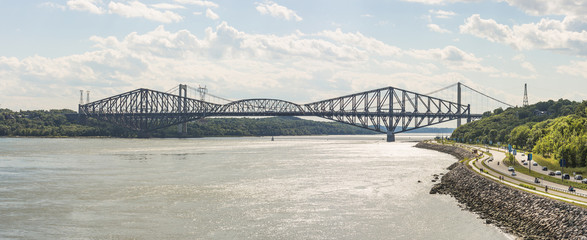 Quebec Bridge is a riveted steel truss structure