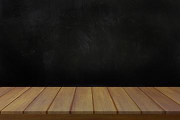wood table on dark background