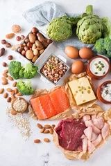 Fototapete Produktauswahl Auswahl an gesunden Proteinquellen und Bodybuilding-Lebensmitteln