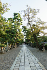A long stone paving way of Gokonomiya shrine in Kyoto, Japan