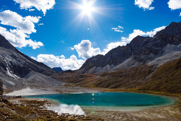 The milk lake that is 4300 meters high above the sea is located in Yading, Sichuan privince of China. It is formed by the snowmelt of the holy mountain in local Tibetan area..
