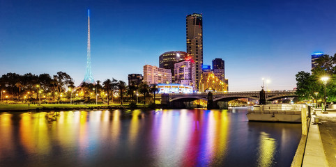 A beautiful view of Melbourne downtown across the Yarra river at night in Melbourne, Victoria, Australia.