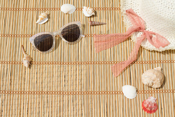 Top view of beach summer accessories with copy space. Lay flat beach accessories