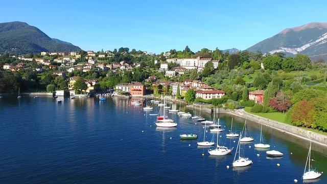 Bellagio - Little port of Pescallo on Como lake in Italy, yacht and sailboats