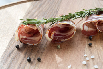 Spanish hamon ready for eat ovet the wooden background