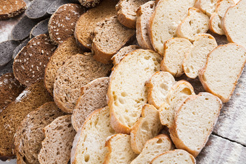 Bakery concept. Plenty of sliced bread background