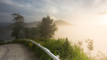 The small road on the mountain. In the morning and the fog with cool air from the mountains.