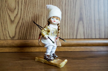 Christmas/Winter Decoration in the Shape of a Child Figurine on Furniture