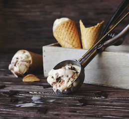 chocolate ice cream in a sugar waffle cones, selective focus