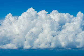 Naklejka na ściany i meble White cloud with blue sky background.