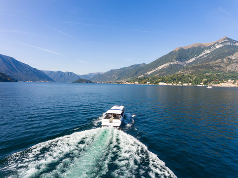 Fast boat on Como lake, aerial view