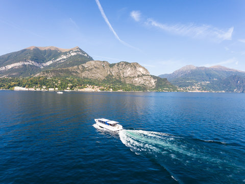 Boat running fast in the lake, aerial view